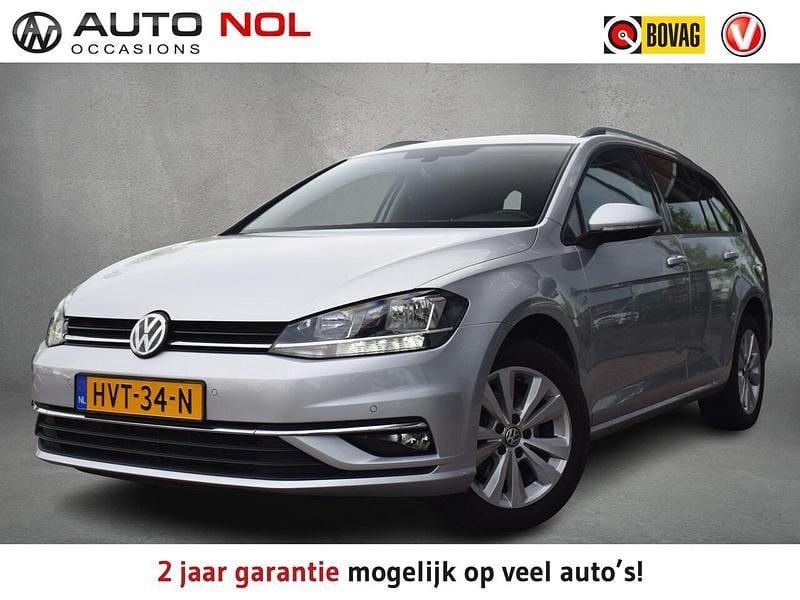 Grijs (metallic) Gebruikt 2020 VW Golf VII Comfortline Stationwagen | € 16.950 (Super prijs) - Afbeelding 1/4