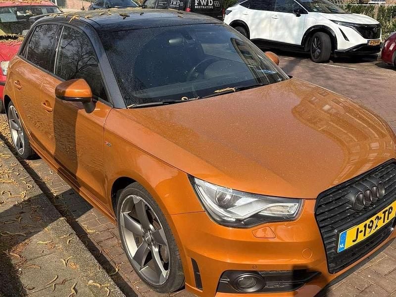 Oranje Gebruikt 2012 Audi A1 Sportback Sport Hatchback | € 12.500 (Iets duurder) - Afbeelding 1/4