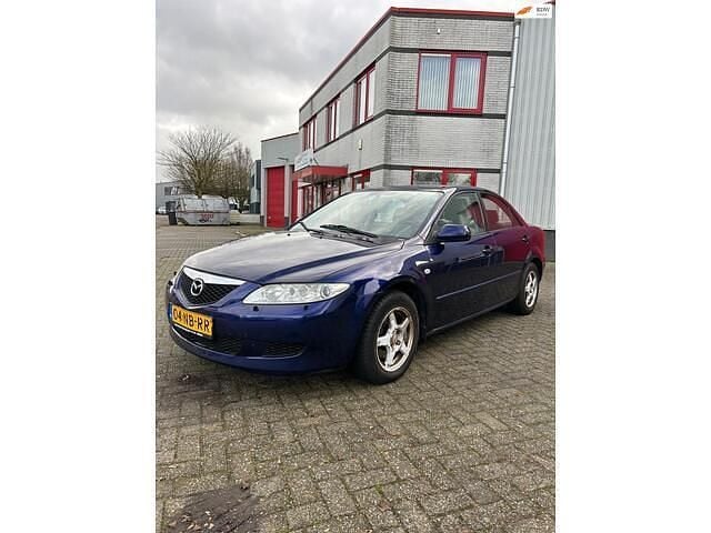 Blauw (metallic) Gebruikt 2003 Mazda 6 Inclusive Sedan | € 1.250 (Eerlijke prijs) - Afbeelding 1/4