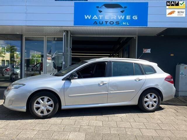 Grijs Gebruikt 2010 Renault Laguna III Dynamique Stationwagen | € 1.450 (Iets duurder) - Afbeelding 1/4