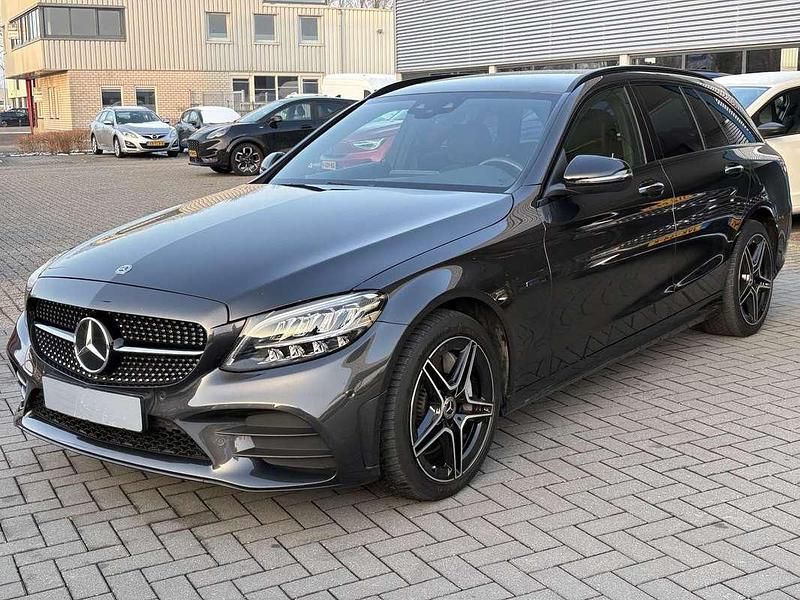 Occasion Mercedes C300e AMG line 320 PK (235 kW) 2020 Zwart Stationwagen
