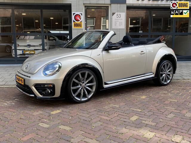 Bruin Gebruikt 2015 VW Beetle Design Cabriolet | € 19.999 - Afbeelding 1/4