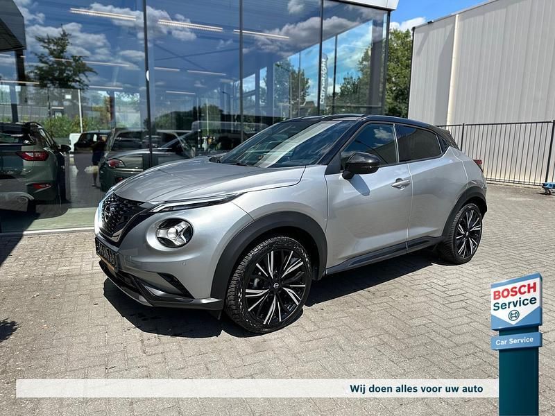Grijs, metallic lak Gebruikt 2023 Nissan Juke SUV | € 21.995 (Eerlijke prijs) - Afbeelding 1/4