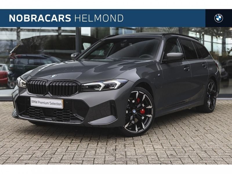 Dravitgrau (grijs metallic) Gebruikt 2024 BMW 330e Comfort Edition Stationwagen | € 59.950 (Iets duurder) - Afbeelding 1/4