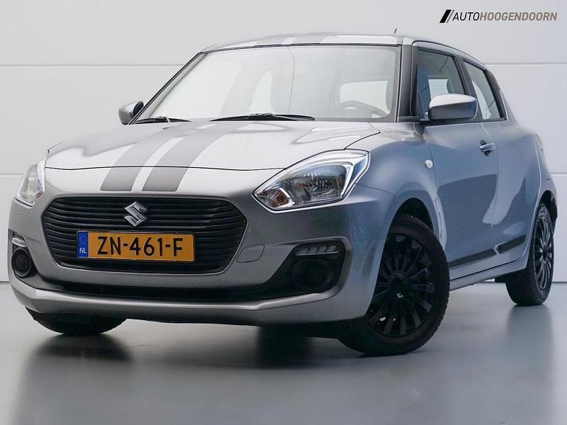 Grijs Gebruikt 2019 Suzuki Swift Comfort Hatchback | € 11.445 (Goede deal) - Afbeelding 1/4