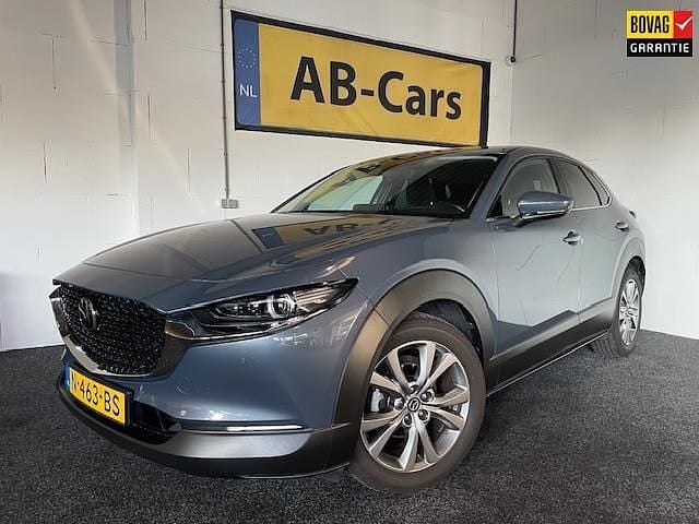 Grijs (metallic) Gebruikt 2021 Mazda CX-30 Sportive SUV | € 23.495 (Goede deal) - Afbeelding 1/4