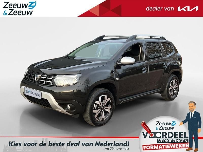Parelzwart 676 Gebruikt 2022 Dacia Duster Prestige SUV | € 17.990 (Goede deal) - Afbeelding 1/4