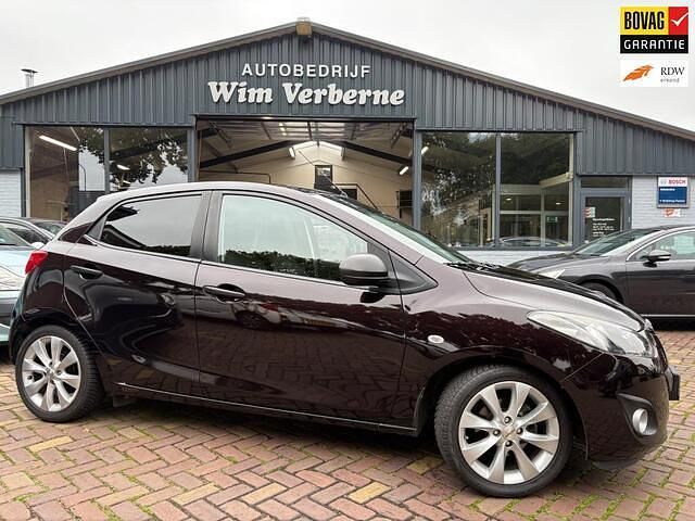Bruin Gebruikt 2013 Mazda 2 Hatchback | € 7.750 (Iets duurder) - Afbeelding 1/4