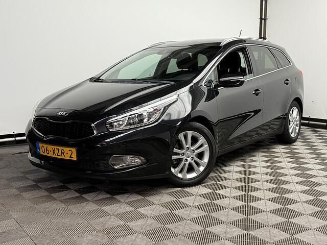 Zwart (metallic) Gebruikt 2012 Kia Ceed Sportswagon Stationwagen | € 8.875 (Eerlijke prijs) - Afbeelding 1/4