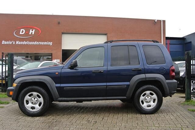 Blauw Gebruikt 2007 Jeep Cherokee Sport SUV | € 4.799 - Afbeelding 1/4