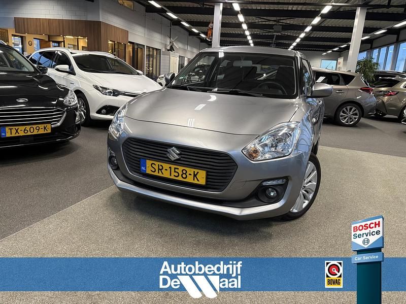 Grijs (metallic) Occasion 2018 Suzuki Swift Hatchback | € 11.350 (Eerlijke prijs) - Afbeelding 1/4