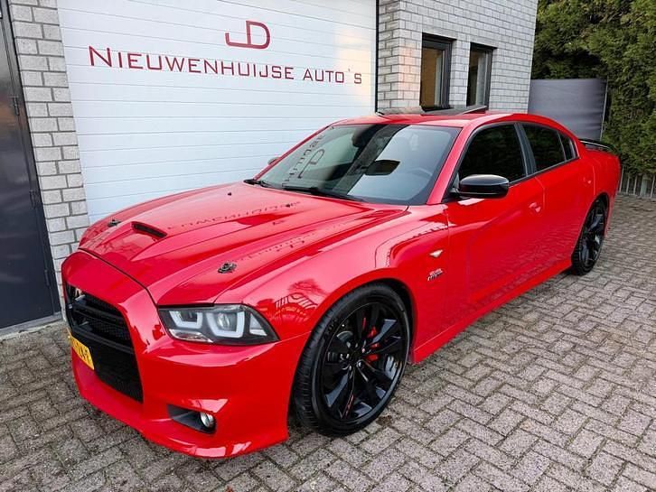 Rood (metallic) Gebruikt 2014 Dodge Charger Sedan | € 31.950 - Afbeelding 1/4