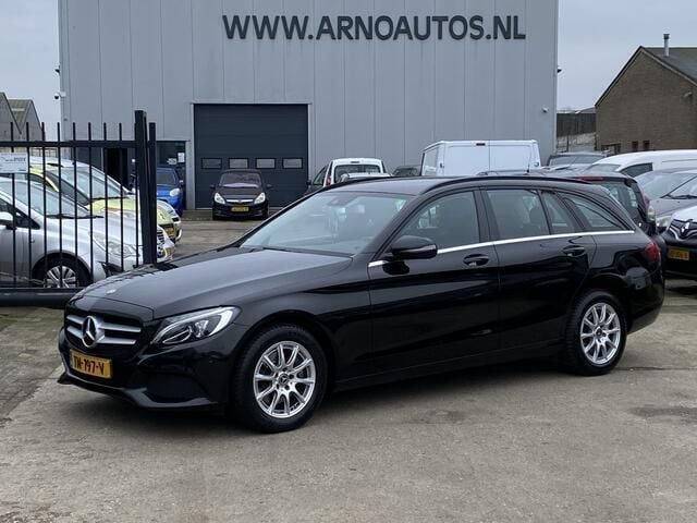 Zwart, metallic lak Gebruikt 2017 Mercedes C200 Premium Stationwagen | € 12.995 (Eerlijke prijs) - Afbeelding 1/4