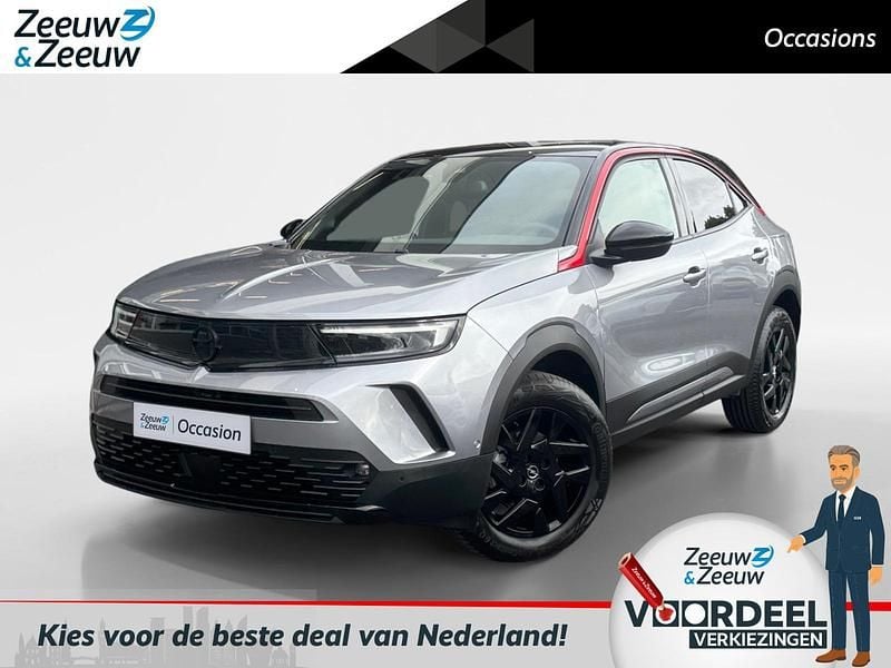 Grijs Gebruikt 2022 Opel Mokka SUV | € 19.999 (Goede deal) - Afbeelding 1/4