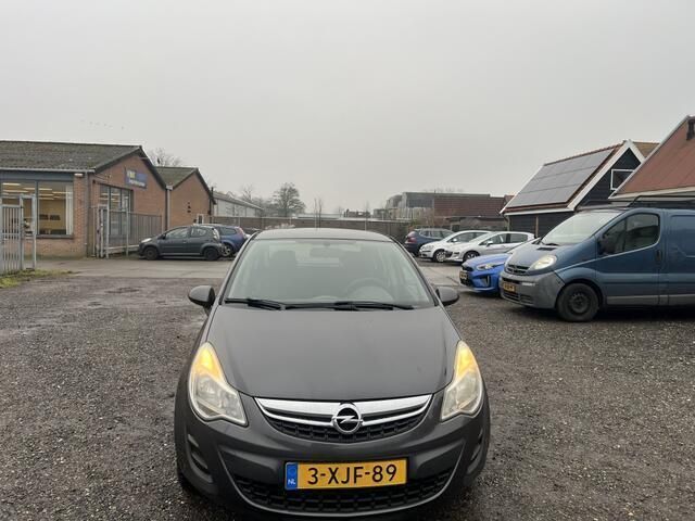 Grijs Gebruikt 2012 Opel Corsa Hatchback | € 3.950 (Eerlijke prijs) - Afbeelding 1/4