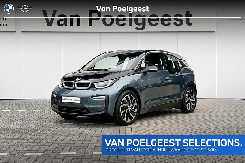 Blue ridge mountain met accent frozen grey metallic (blauw metallic) Gebruikt 2021 BMW i3 Comfort Edition Hatchback | € 21.900 (Eerlijke prijs) - Afbeelding 1/4