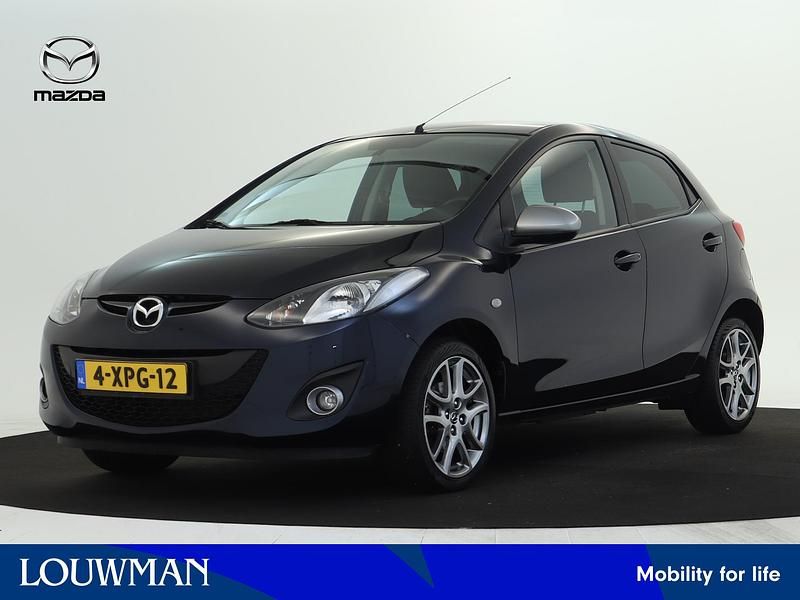 Blauw metallic Gebruikt 2014 Mazda 2 Edition Hatchback | € 9.885 (Eerlijke prijs) - Afbeelding 1/4