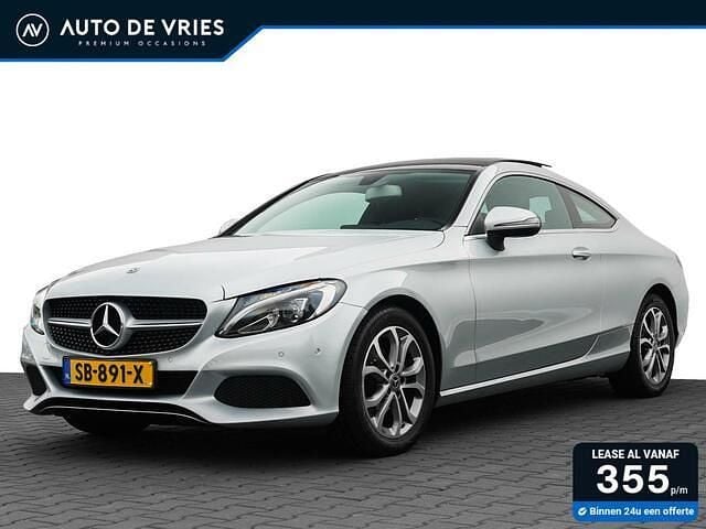 Grijs, metallic lak Gebruikt 2018 Mercedes C180 Business Coupé | € 21.950 (Super prijs) - Afbeelding 1/4