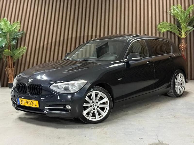 Zwart Gebruikt 2011 BMW 116 Hatchback | € 6.995 (Goede deal) - Afbeelding 1/4