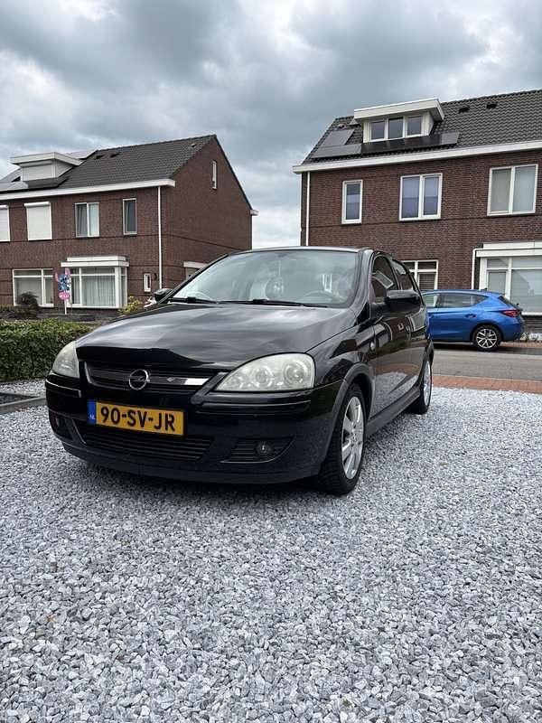 Zwart Gebruikt 2006 Opel Corsa Hatchback | € 990 (Goede deal) - Afbeelding 1/4