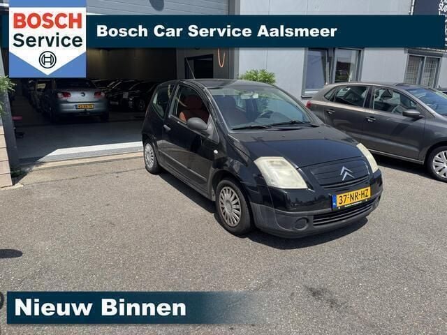 Zwart Gebruikt 2004 Citroën C2 Prestige Hatchback | € 950 (Goede deal) - Afbeelding 1/4