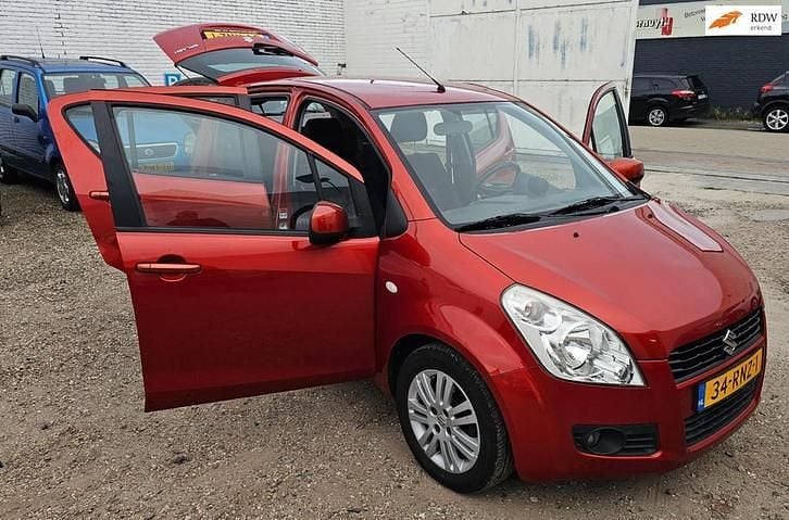 Oranje (metallic) Gebruikt 2011 Suzuki Splash Exclusive Hatchback | € 3.199 (Goede deal) - Afbeelding 1/4