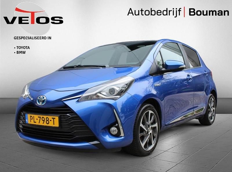 Blauw (metallic) Gebruikt 2017 Toyota Yaris Hybrid Premium Hatchback | € 14.950 (Eerlijke prijs) - Afbeelding 1/3