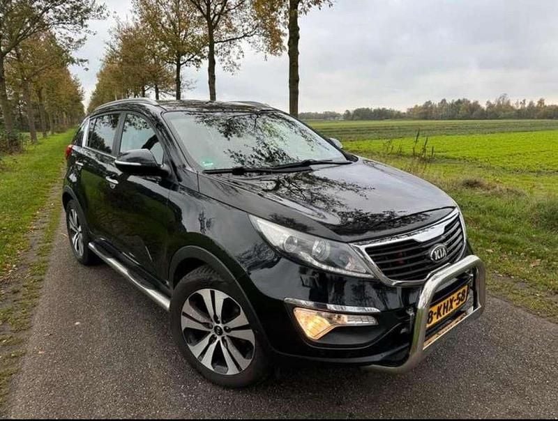 Zwart Gebruikt 2013 Kia Sportage SUV | € 10.000 (Eerlijke prijs) - Afbeelding 1/4