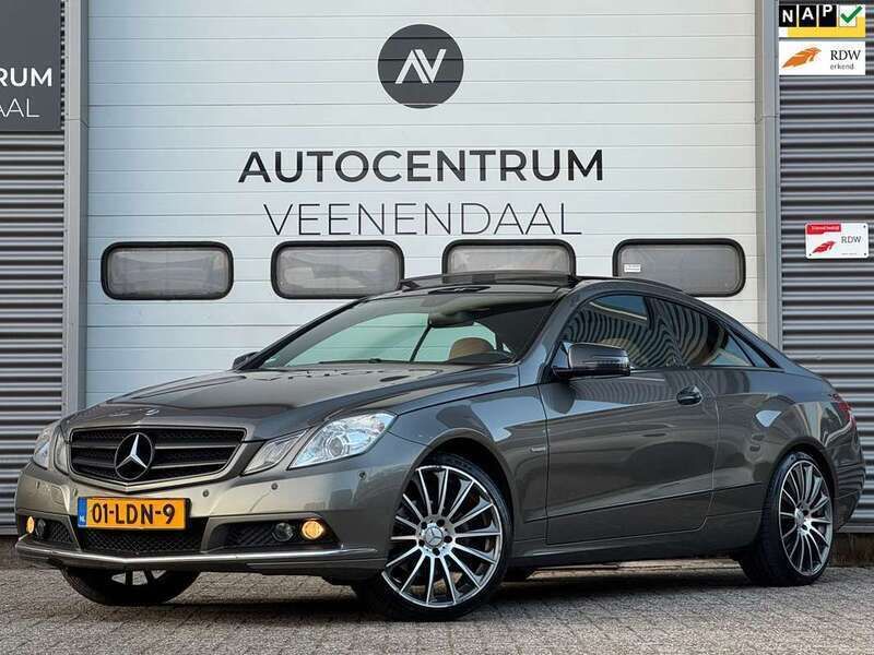 Grijs, metallic lak Gebruikt 2010 Mercedes E250 Avantgarde Coupé | € 11.750 (Eerlijke prijs) - Afbeelding 1/4