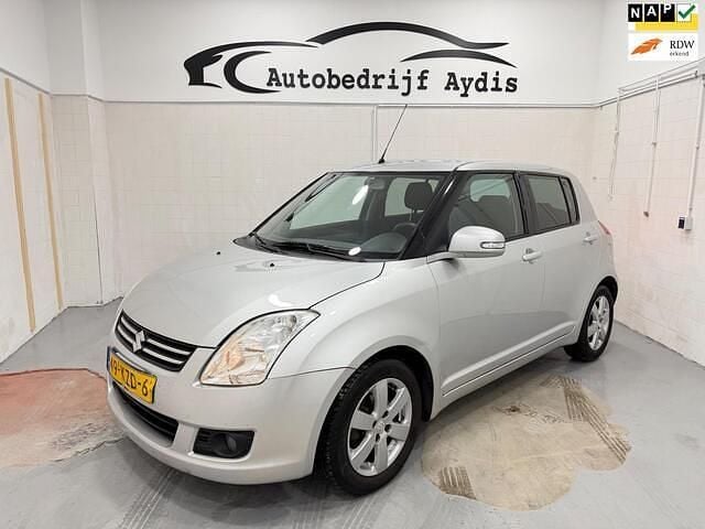 Grijs (metallic) Gebruikt 2010 Suzuki Swift Limited Hatchback | € 2.499 (Goede deal) - Afbeelding 1/4