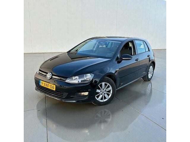 Zwart (metallic) Gebruikt 2014 VW Golf VII Comfortline Hatchback | € 7.999 (Goede deal) - Afbeelding 1/4