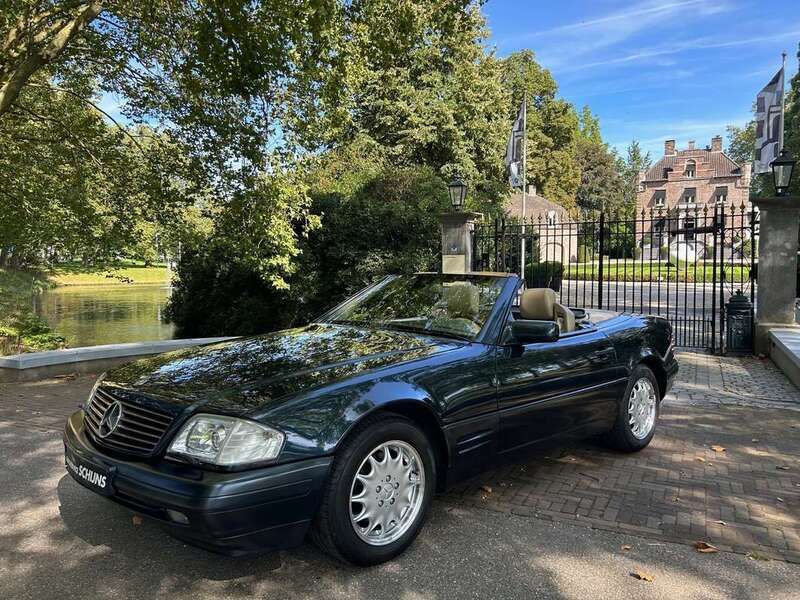 Blauw, metallic lak Gebruikt 1997 Mercedes SL320 Cabriolet | € 24.950 - Afbeelding 1/4