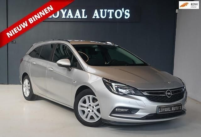 Grijs Gebruikt 2019 Opel Astra Edition Stationwagen | € 8.999 (Goede deal) - Afbeelding 1/4
