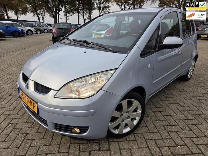Blauw (metallic) Gebruikt 2004 Mitsubishi Colt Instyle Hatchback | € 2.250 (Eerlijke prijs) - Afbeelding 1/4