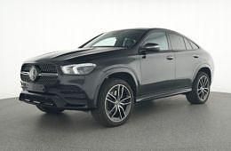Donker obsidiaanzwart metallic Gebruikt 2023 Mercedes 350 Premium Plus Coupé | € 84.945 - Afbeelding 1/4