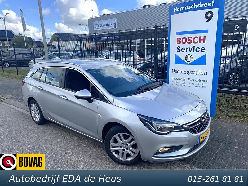 Grijs Gebruikt 2016 Opel Astra Edition Stationwagen | € 10.495 (Eerlijke prijs) - Afbeelding 1/4