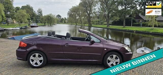 Paars Gebruikt 2005 Peugeot 307 CC Cabriolet | € 2.950 (Eerlijke prijs) - Afbeelding 1/4