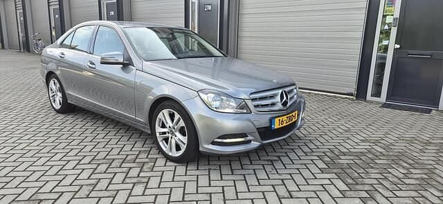 Grijs Gebruikt 2012 Mercedes C180 Avantgarde Sedan | € 8.995 (Goede deal) - Afbeelding 1/4