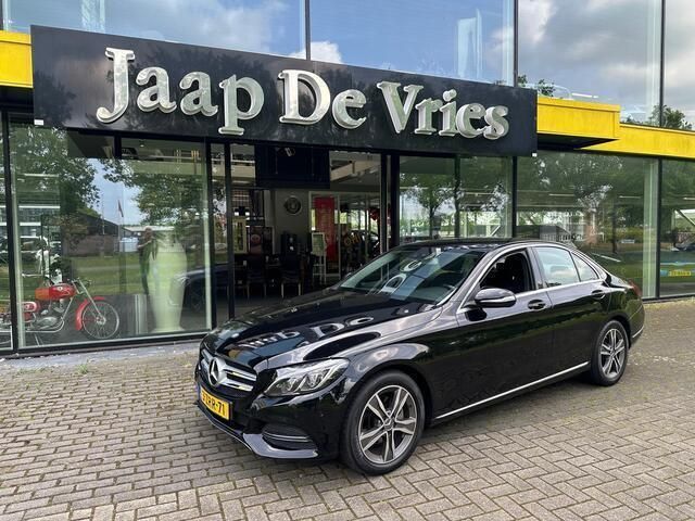 Zwart, metallic lak Gebruikt 2015 Mercedes C180 Edition Sedan | € 17.950 (Iets duurder) - Afbeelding 1/4