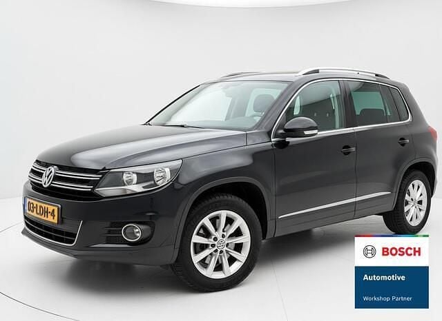 Zwart Occasion 2012 VW Tiguan Sport SUV | € 10.490 (Iets duurder) - Afbeelding 1/4