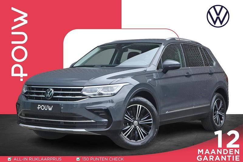 Grijs Gebruikt 2022 VW Tiguan SUV | € 30.900 (Goede deal) - Afbeelding 1/4