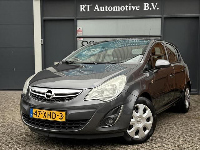 Grijs Gebruikt 2012 Opel Corsa Hatchback | € 3.950 (Eerlijke prijs) - Afbeelding 1/4
