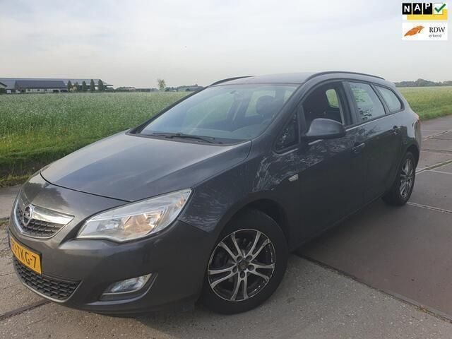 Grijs Gebruikt 2012 Opel Astra Business Edition Stationwagen | € 1.500 (Goede deal) - Afbeelding 1/4