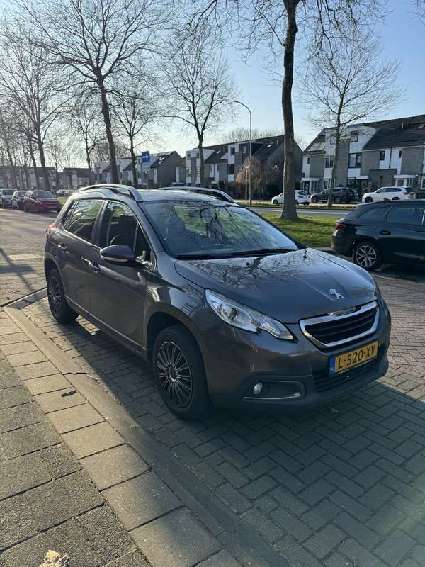 Grijs Gebruikt 2016 Peugeot 2008 Access SUV | € 7.000 (Goede deal) - Afbeelding 1/4
