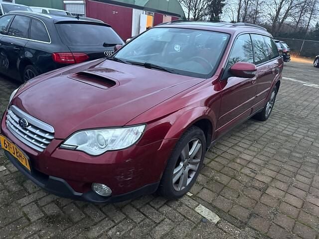 Rood Occasion 2009 Subaru Outback Stationwagen | € 999 - Afbeelding 1/4