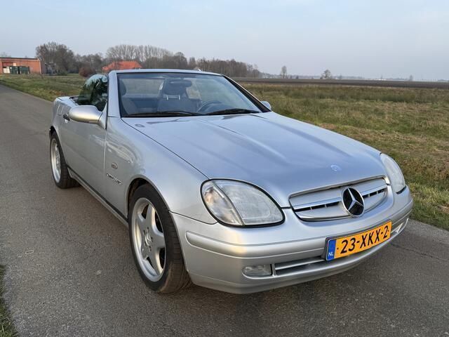 Grijs Gebruikt 1997 Mercedes SLK230 Cabriolet | € 3.950 (Goede deal) - Afbeelding 1/4