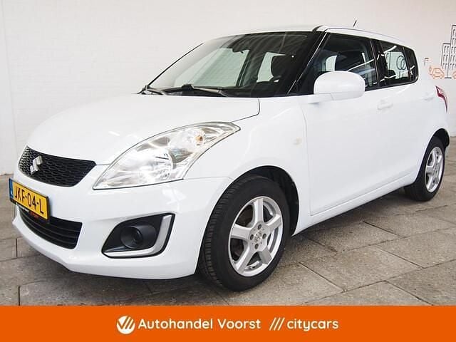 Wit Gebruikt 2015 Suzuki Swift Comfort Hatchback | € 8.745 (Eerlijke prijs) - Afbeelding 1/4
