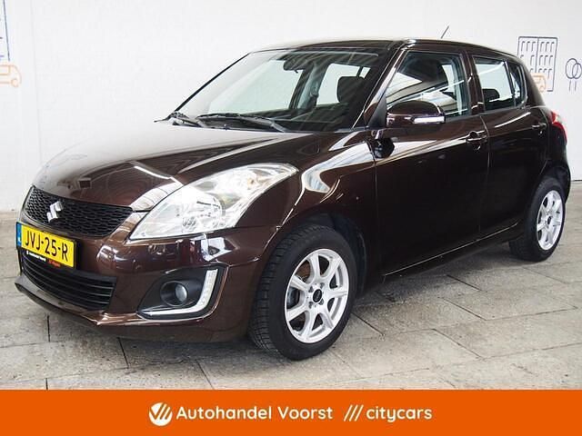 Bruin Occasion 2014 Suzuki Swift Hatchback | € 8.695 (Eerlijke prijs) - Afbeelding 1/4