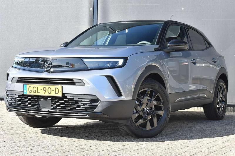 Grijs Gebruikt 2024 Opel Mokka SUV | € 26.750 (Eerlijke prijs) - Afbeelding 1/4