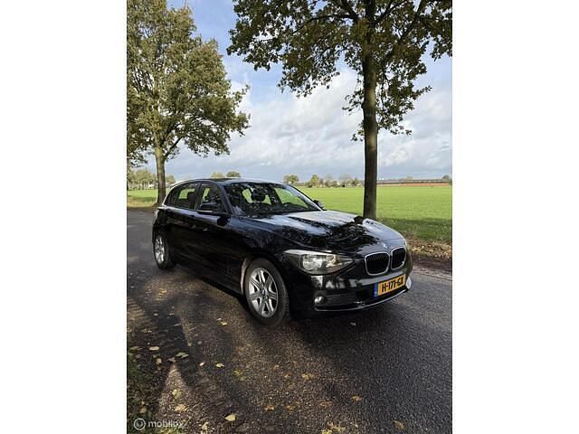 Zwart Gebruikt 2011 BMW 116 Hatchback | € 3.595 (Super prijs) - Afbeelding 1/4